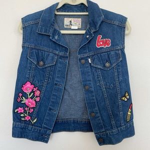 Vintage Levi’s vest with added patches size Small